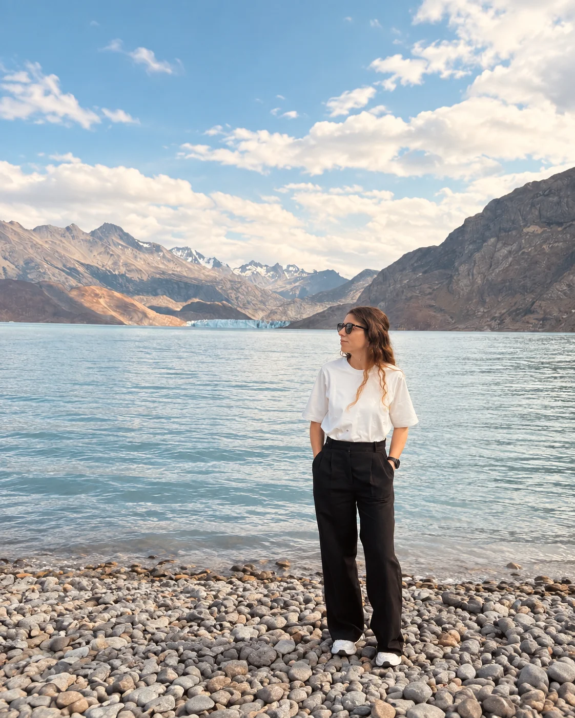 Fernanda by a lake in the mountains